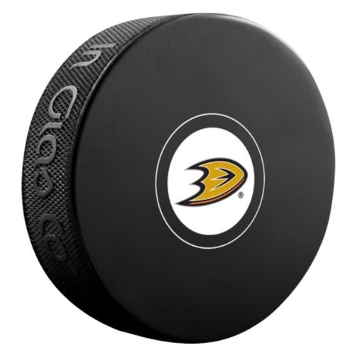 black unsigned puck featuring small Anaheim Ducks duck foot logo within a white circle 